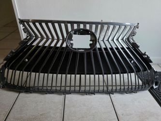 2021 Brand new front grille for Lexus ES. Never installed. Original spindle style design with black finish. All mounting tabs intact