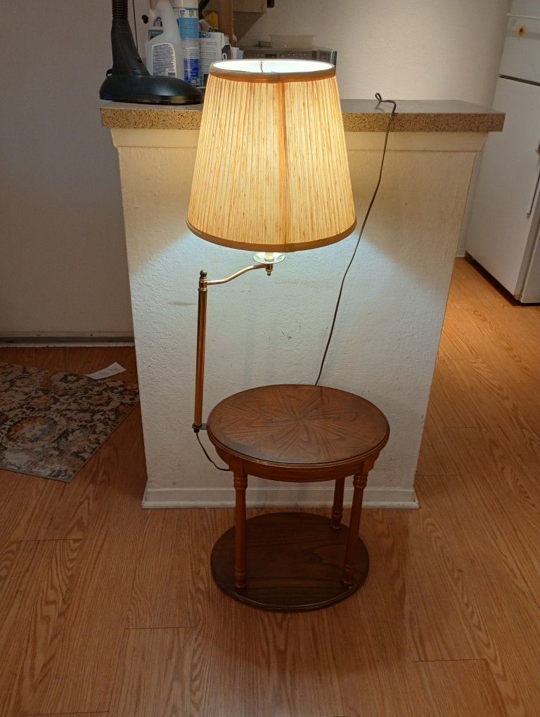 Cute Wooden Oval Shaped End Table With Attached Lamp 