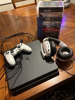 PS4 Slim 1TB Bundle + 12 Games, Controller & Headset