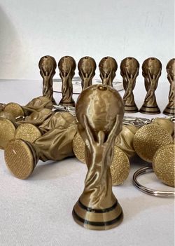 🏆 FIFA Trophy Keychain – Metallic Bronze Gold