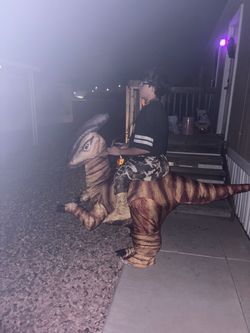 Inflatable dinosaur costume