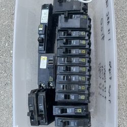 Lot of 15 used Square D Breakers, 7 20 singles, 3 15 singles, 1 30 single, 1 70 single, 2 50 singles, 1 15 ARC FAULT