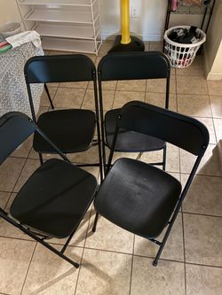 Set of 4 plastic foldable chairs