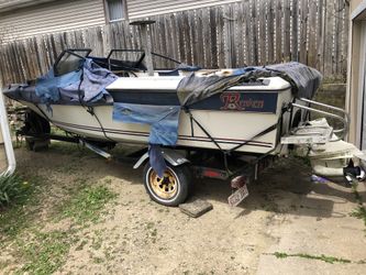 Project boat. Engine good trailers is shoreline trlr is a 83 year