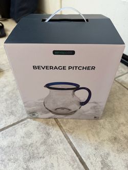Moving sale New glass beverage pitcher