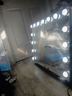("Vanity mirror ") -("by bright face")