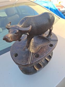 Vintage handmade pipe stand.