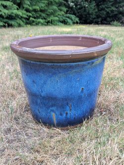 large outdoor ceramic plant pot with drainage holes