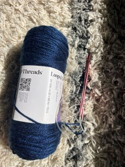 Yarn and needles (size 5.50m)