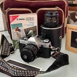 Canon AE 1 35 Mm W/ Accessories 