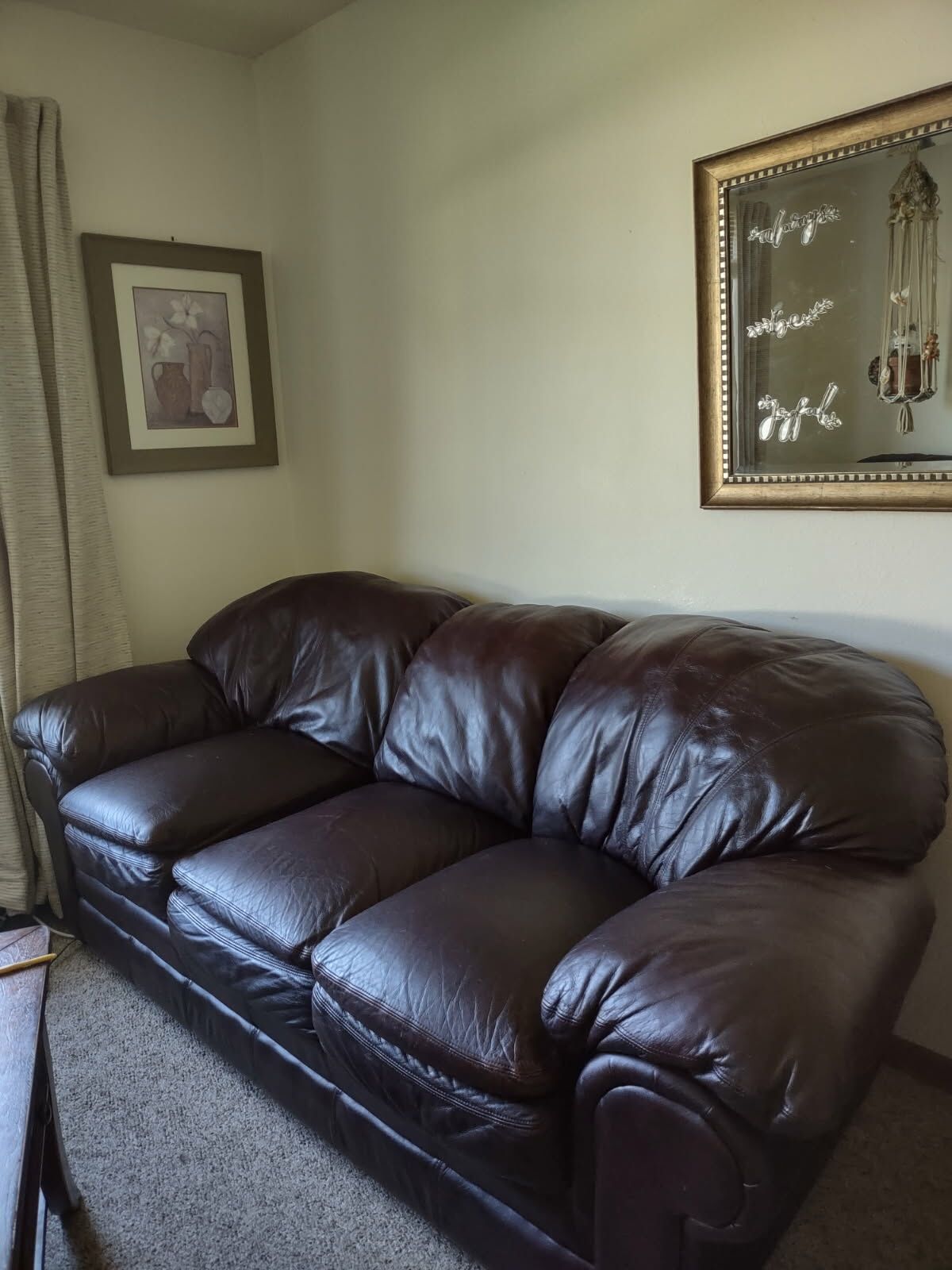 Leather couch, and loveseat with coffee table and end table