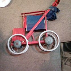 Steel Antique Fold Up Baby Stroller.