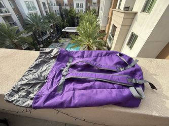 Purple laundry bag (like a backpack)