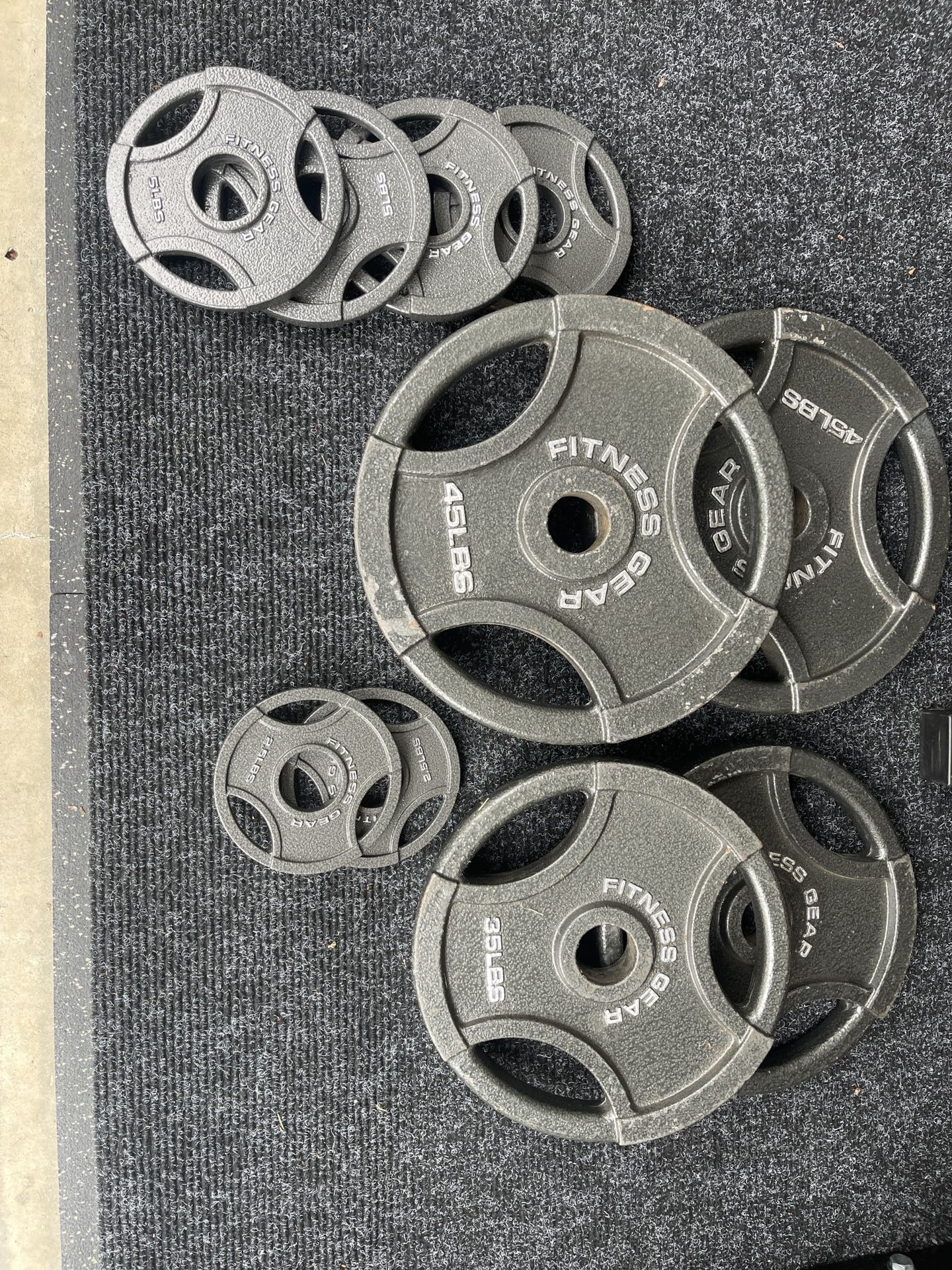185 pounds of Olympic weight plates