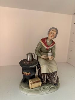 Italian Statue lady selling roasted chestnuts