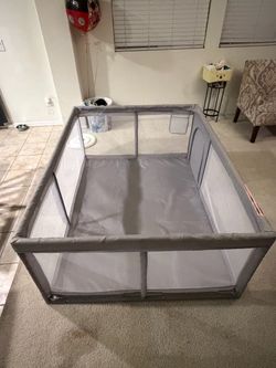 Child’s Play Yard . Light Gray in great condition dimensions are (69 x49 x 25) pretty good size ) keeps them secure .