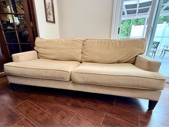 Pale yellow chenille couch