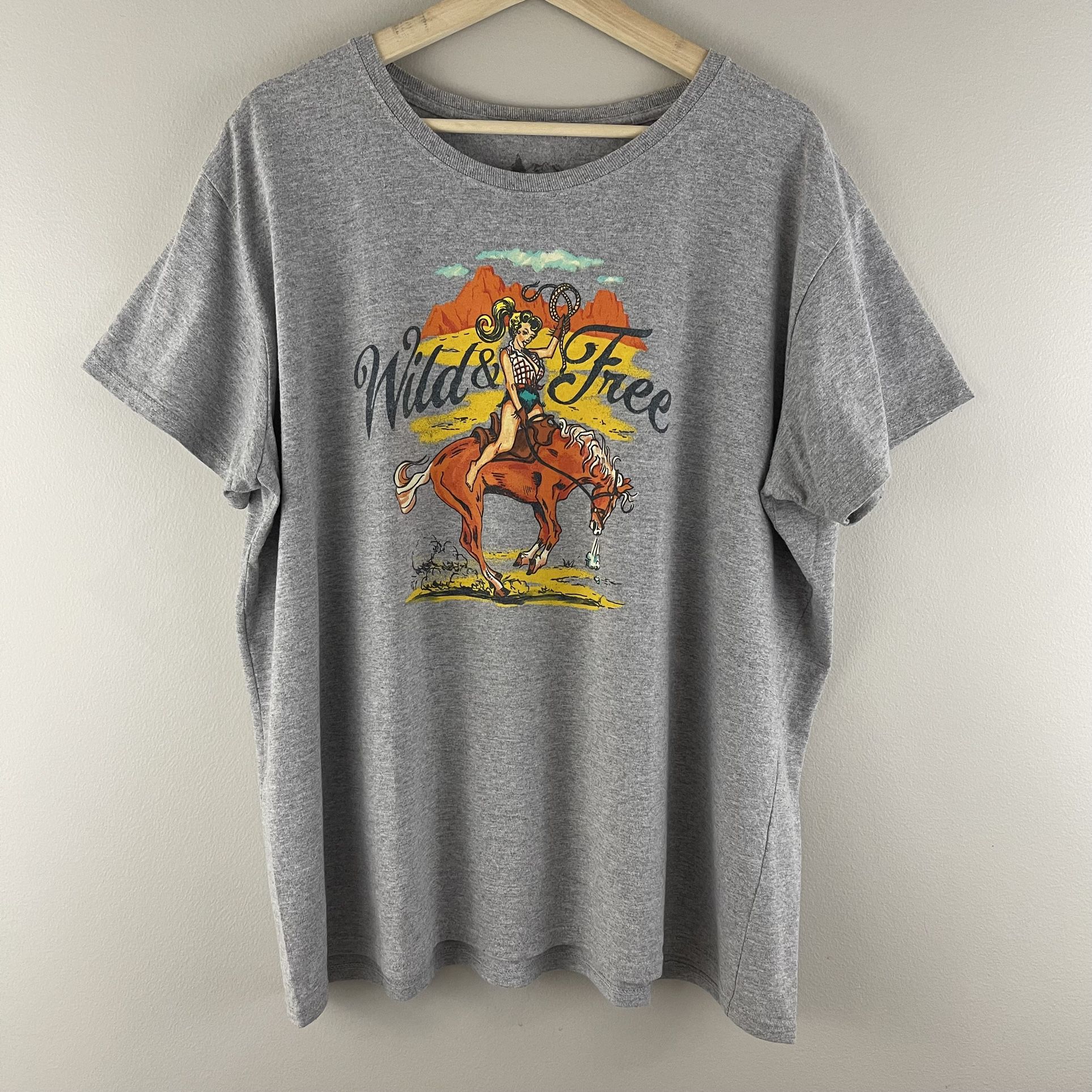 Western Heathered Grey “Wild & Free” Pinup Cowgirl Horse Riding Graphic Tee