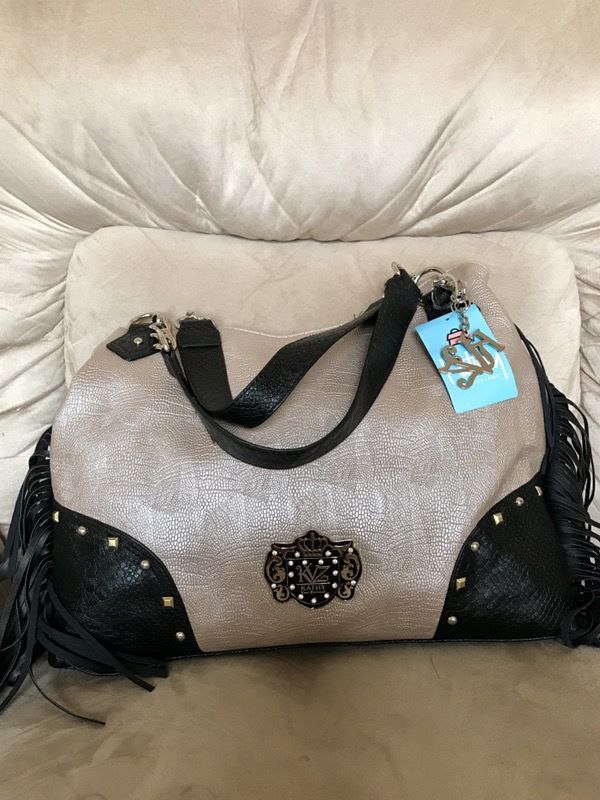 Kathy Van Zeeland fringe purse with tags