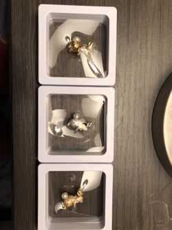 Gold, silver, and bronze plated bunny brooch pins with pearl tails beautiful!