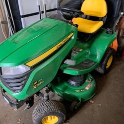 John deere riding lawnmower. Less than 17 hours on it. My dad is buying a house with a smaller yard. Must pick up in Hillsboro $4,500 OBO