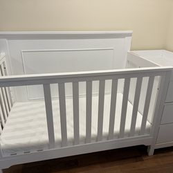 Toddler crib and mattress