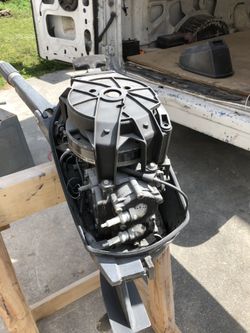 25 hp Evinrude Needs stator replaced. Good compression.