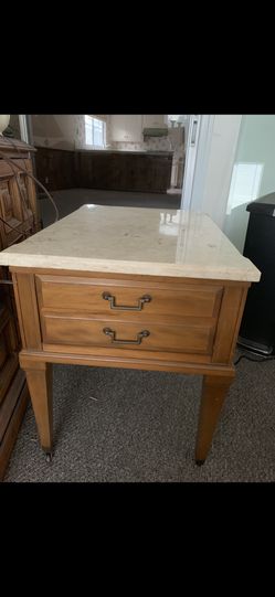 Stylish end table with wheels and stone top