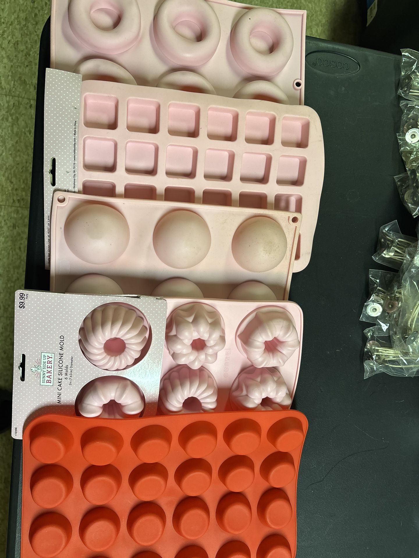 Five molds for dessert, candles