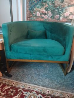 Green velvet barrel chair