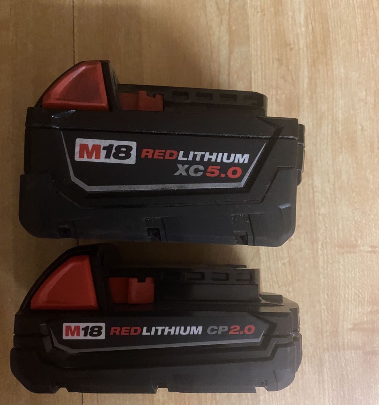 Milwaukee 5.0 lightly used and new 2.0 18v batteries 100 for both