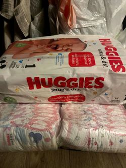 Huggies snug and dry grow with me bundle pack size 1 & 2