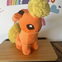 POKÉMON EVEE EVOLUTION 11 INCH SOFT ORANGE  AND YELLOW PLUSH