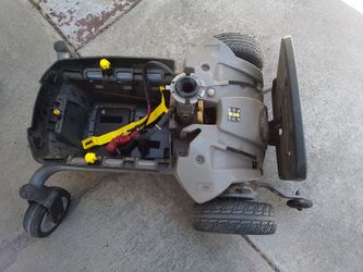 Pair of 24v jazzy select Elite electric reversible motors with chassi & airless tires