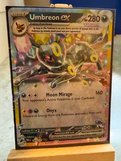 Umbreon Prismatic Eeveelution with other Holo Cards