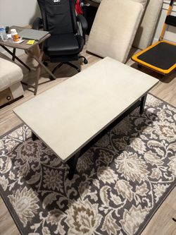 coffee-table with Stone Top and Black Metal Legs
