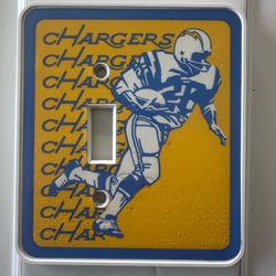 Vintage 1973 San Diego Chargers football light switch cover  5” tall x 4 3/8” wide  Marked on the back 1973 nfl properties Inc.