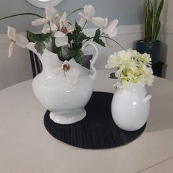 Two beautiful Decorations Pitchers, one is Morocco  design on it, the other one is small with two little handles, flowers are included  $8 for both 