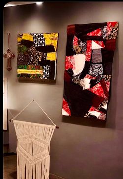 2 upcycled fabric artworks