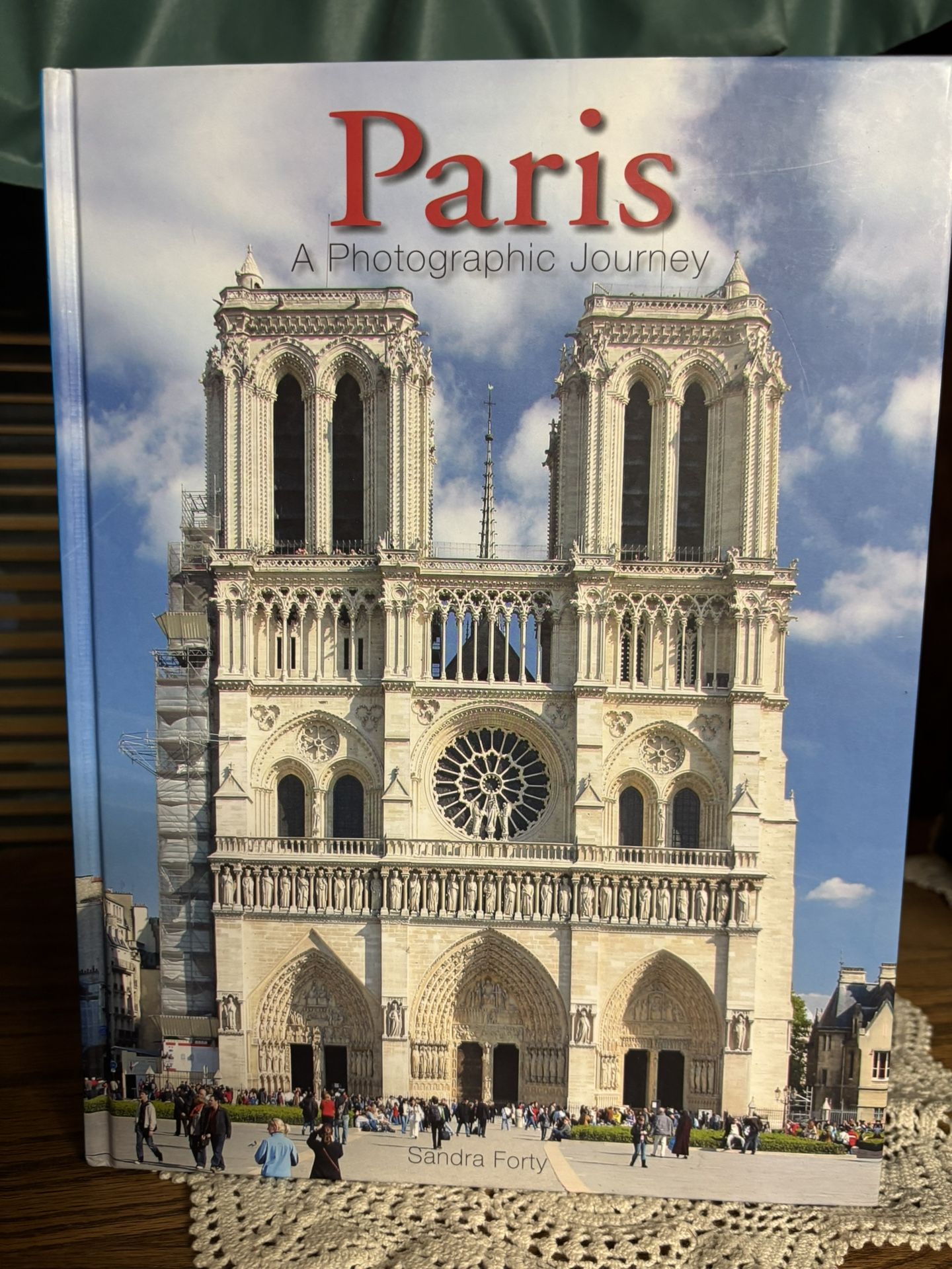 “Paris: A Photographic Journey" by Sandra Forty is a stunning hardback book published by Chartwell Books in 2019.