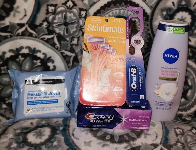 Womens hygiene bundle: Nivea Bodywash, Skintimate Razor, Crest, Oral B And Nivea Makeup Wipes