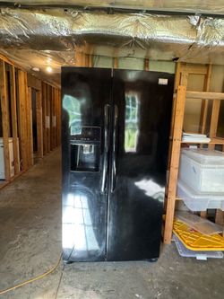 Free Frigidaire Gallery side-by-side refrigerator.