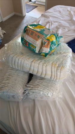 Newborn diapers/ pampers