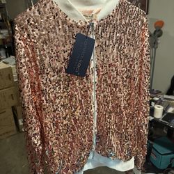 Large women’s sequence, zip up jacket $15 medium size sequence shirt $15 I have multiple of the same jackets