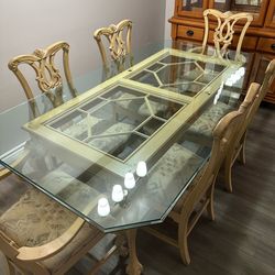 Glass dining room table with 6 chairs