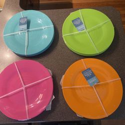 Plastic colorful plates Set Of 4 Included. 