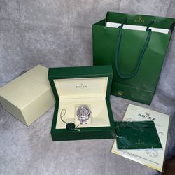 Bustdown watch comes with box and bag