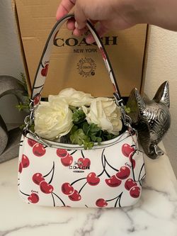 Red and white coach bag for women