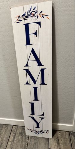 White and Blue Wooden Family Sign