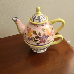 Teapot with cup